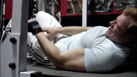 Michael Gundill performs 1 arm cable reverse curls