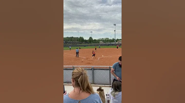 Ella Thornton #20 RF throws to Home for double pla...