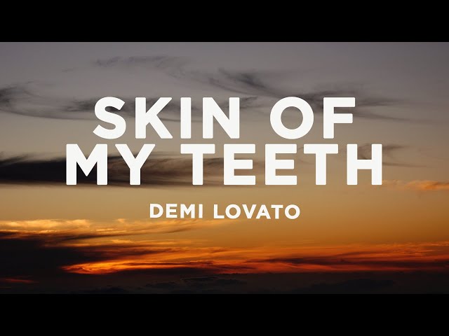 Demi Lovato - SKIN OF MY TEETH (Lyrics) class=