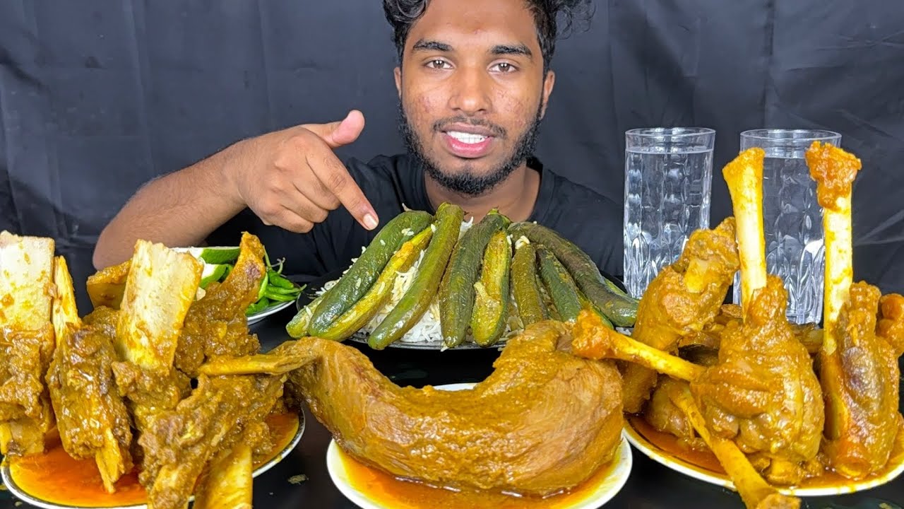 Spicy Mutton curry , buffalo chaap curry , brinjal curry and buffalo tongue curry with rice eating 
