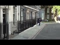 Healey, Miliband and Mahmood leave Downing Street after being named in Cabinet | AFP