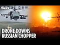 Combat drone smashes into Russian helicopter sending it spiralling into the ground