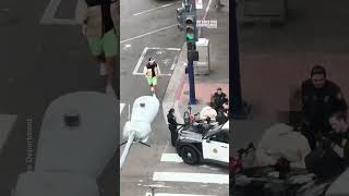 Police Officers Confused as a Man with a VR Headset Crosses the Street