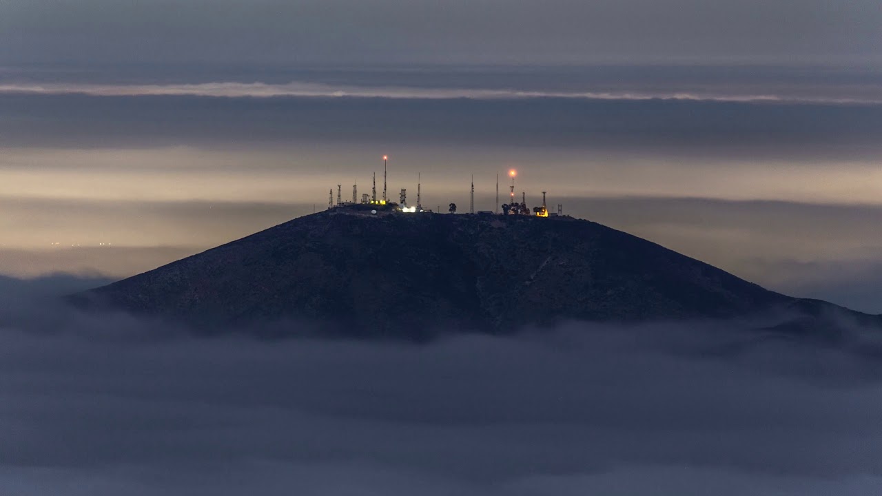 Mountain Drowning In Clouds - YouTube
