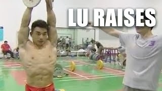 LIAO Hui explaining LU Raises and a Shoulder Workout with rubber band