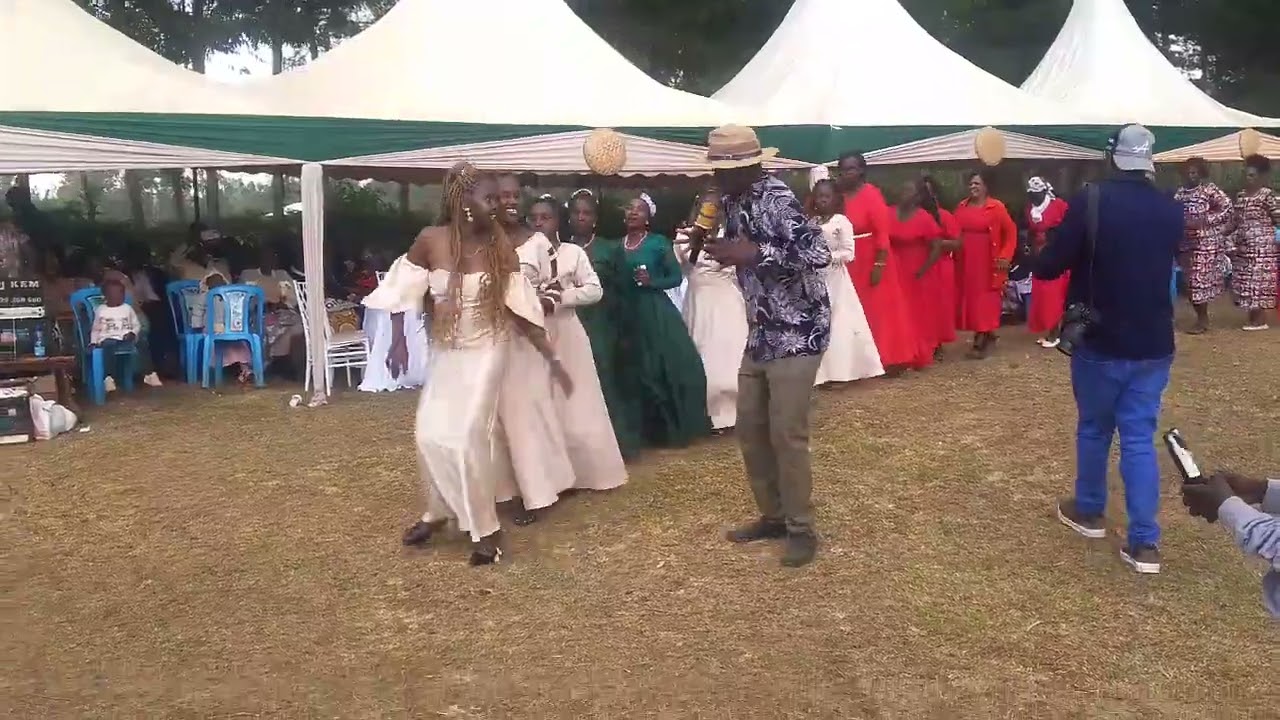 Sheree at Ngeria Uasin Gishu county with dj KEM congratulations Alice and Reuben on your engagement 