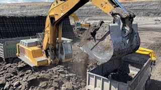 Liebherr 974 Excavator Loading Mercedes And MAN Trucks