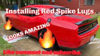Installing 2 piece red spike lug nuts on my Dodge Challenger RT!