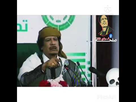 معمر القذافي ايطاليا اعتذار و تقبيل يد ابن شيخ الشهيداء عمر المختار معمر القذافي عمر المختار