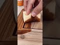 staining light brown wood surface precisely using a professional handheld sponge and dark wood stain