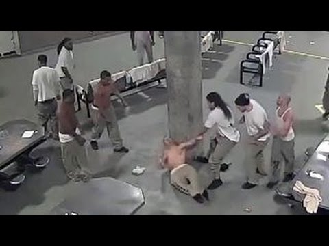 Warning, graphic video: Violent prison brawl caught on tape