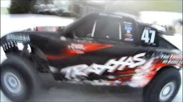 slash 4x4 paddle tires in the snow