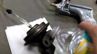 Pressure testing vacuum operated EGR valve