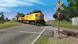 UP Dash 9 Lightning stripe leads a UP Grain Train Through Leadvile Subdivison With UP SD70M Leading.