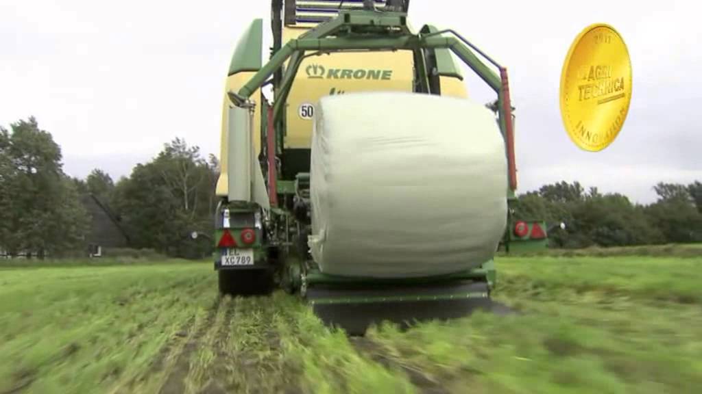 Hauser Landtechnik -- Krone Ultima: Non-Stop Rundballen Press-Wickelkombination
