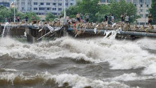 River overflow, China city are under water Car and street flooded in Zhejiang