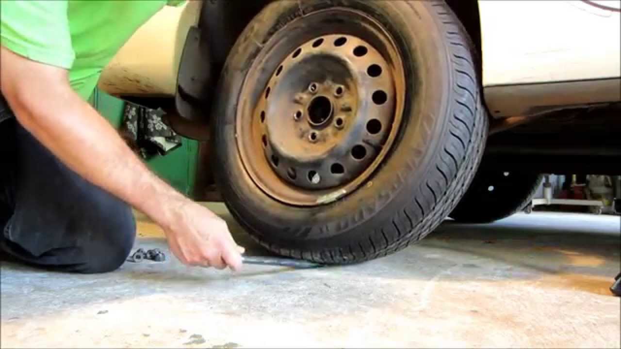 How do you store a replacement spare tire in your car?