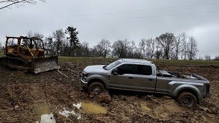 10,000 lb truck stuck in a pond!