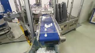 Cap assembly machine