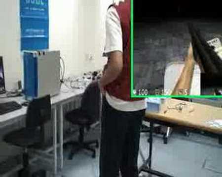 Immersive First Person Shooting Game with TUI