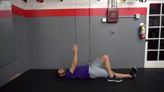 Figure 4 Bridge exercise demonstration by Dr. Brian Fischer