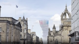 Vibrant contrails fill the sky as Red Arrows perform dazzling flyover at Edinburgh Military Tattoo