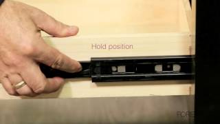 This video shows you how to remove and reattach drawers with side glides.