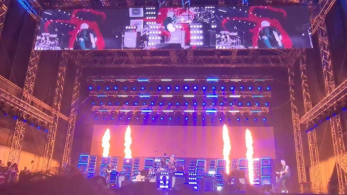An epic stage setup with towering structures and pyrotechnics marks the Foo Fighters concert at Carnaval Ancol.
