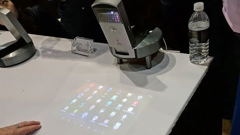 This Computer Projects a Touch Screen Onto Any Surface