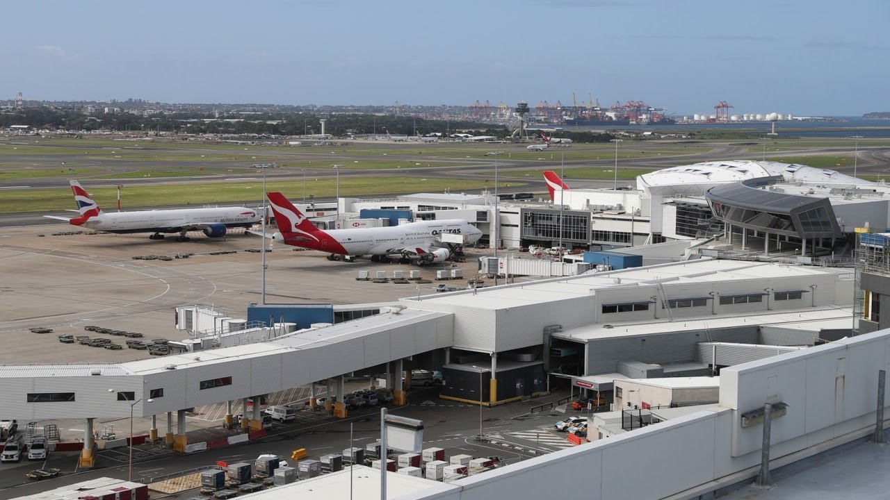 Thousands of citizens placed into hotel quarantine as 97 flights return to Sydney