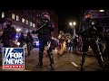 Protests erupt nationwide as election results are delayed (GRAPHIC WARNING)
