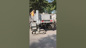 Concrete Curb Machine in Action