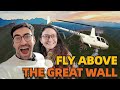 I took a french tourist to fly a private helicopter above the great wall of china