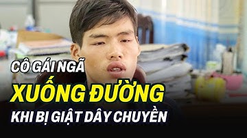 Cô gái ngã xuống đường khi bị giật dây chuyền