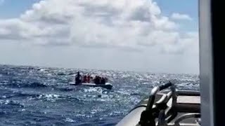 Video shows 8 people on inflatable boat after vessel begins to sink