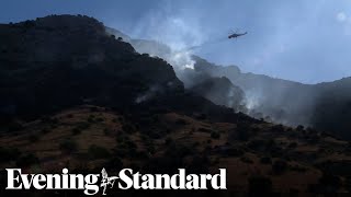 Firefighters battle wildfires across Europe amid heatwave