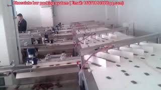 Chocolate bar flow wrapping packing system