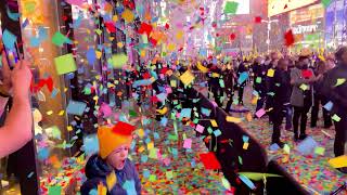 Walking through Times Square confetti  on January 1, 2022