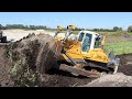 Liebherr PR744 der Fa. Seilbagger Gran beim Humus schieben / Liebherr PR744 pushing topsoil