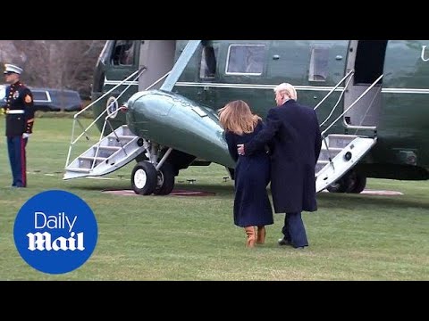 President Trump catches First Lady Melania as she stumbles - Daily Mail