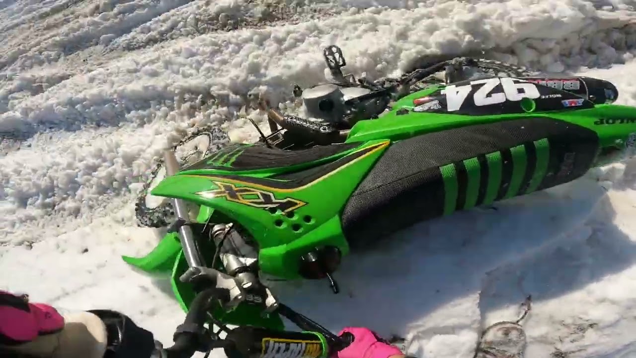 Pit Bike Racing On Motocross Track In Deep Snow