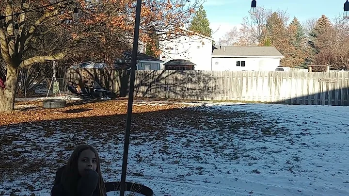 Uncle Kyle and the grandkids snowmobile