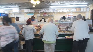 What are local businesses seeing with Alabama's lowest unemployment rate?