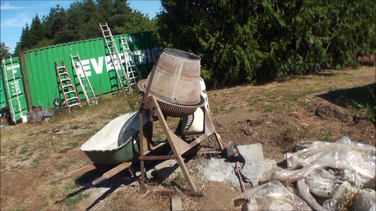 Part 5 Filling the Cinder Block Foundation Wall - YouTube