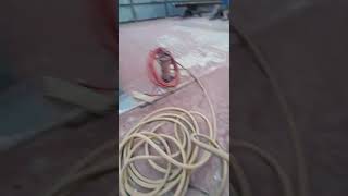 Blasting and painting equipment setup.