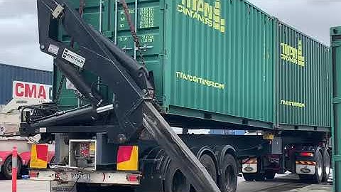 Hammar SideLifter Loading two 20ft Hi Cube Containers