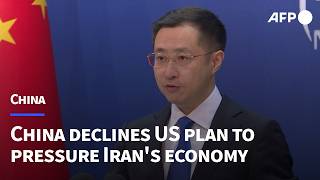 China says US 'sanctions and pressure' on Iran not a solution | AFP