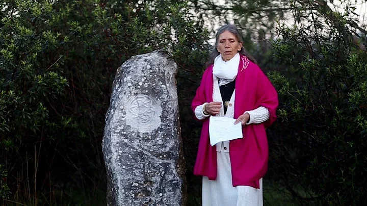 Sarah Vollmer presents the Balance of Powers stone...