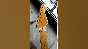Nitrocellulose lacquer clear coat on maple fender Stratocaster