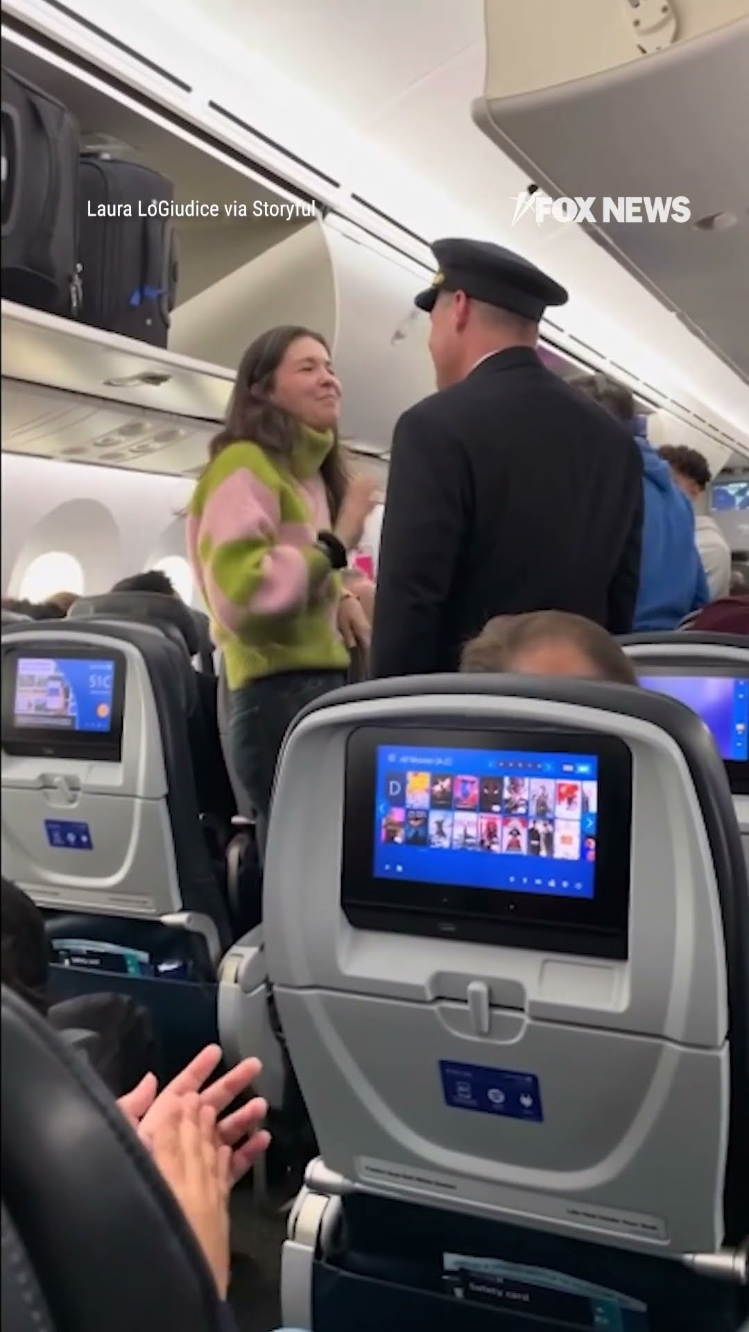 Pilot steps out of the cockpit to hug a passenger who saved his life with a bone marrow donation